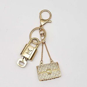 100% Auth Louis Vuitton Lock & Key with unbranded Bagcharm, Keycharm, Keychain